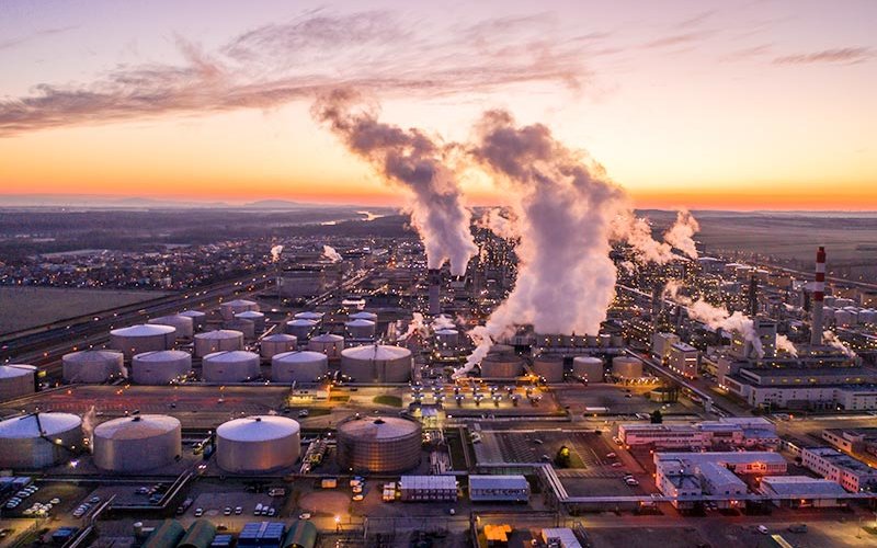 Aerial view of refinery at sunset