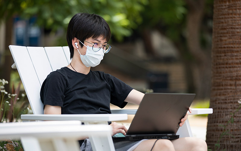 Student working on laptop