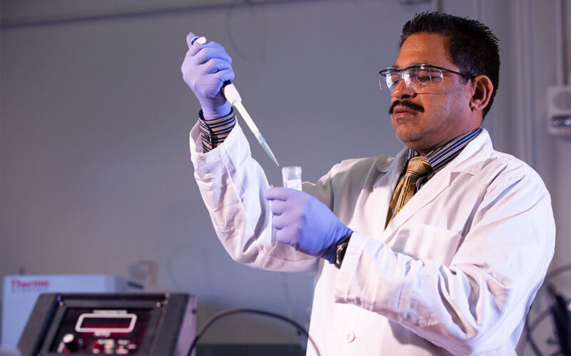 Sudarshan Kurwadkar works in his lab