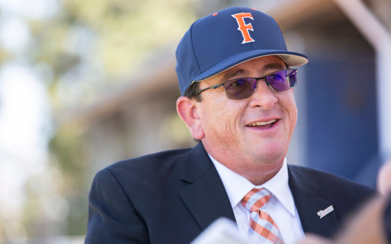 man wearing sunglasses and a baseball cap