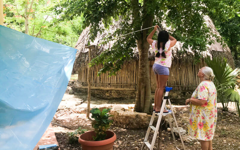 Indigenous Mayan family working together