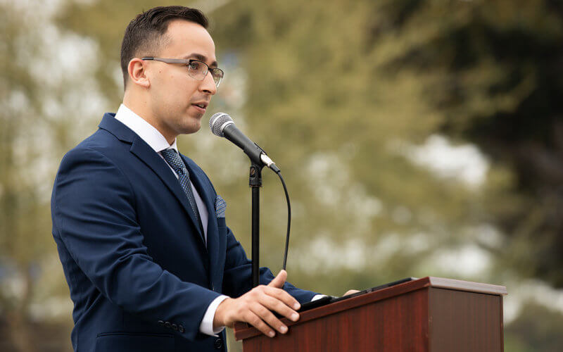 James Burandt speaking at podium