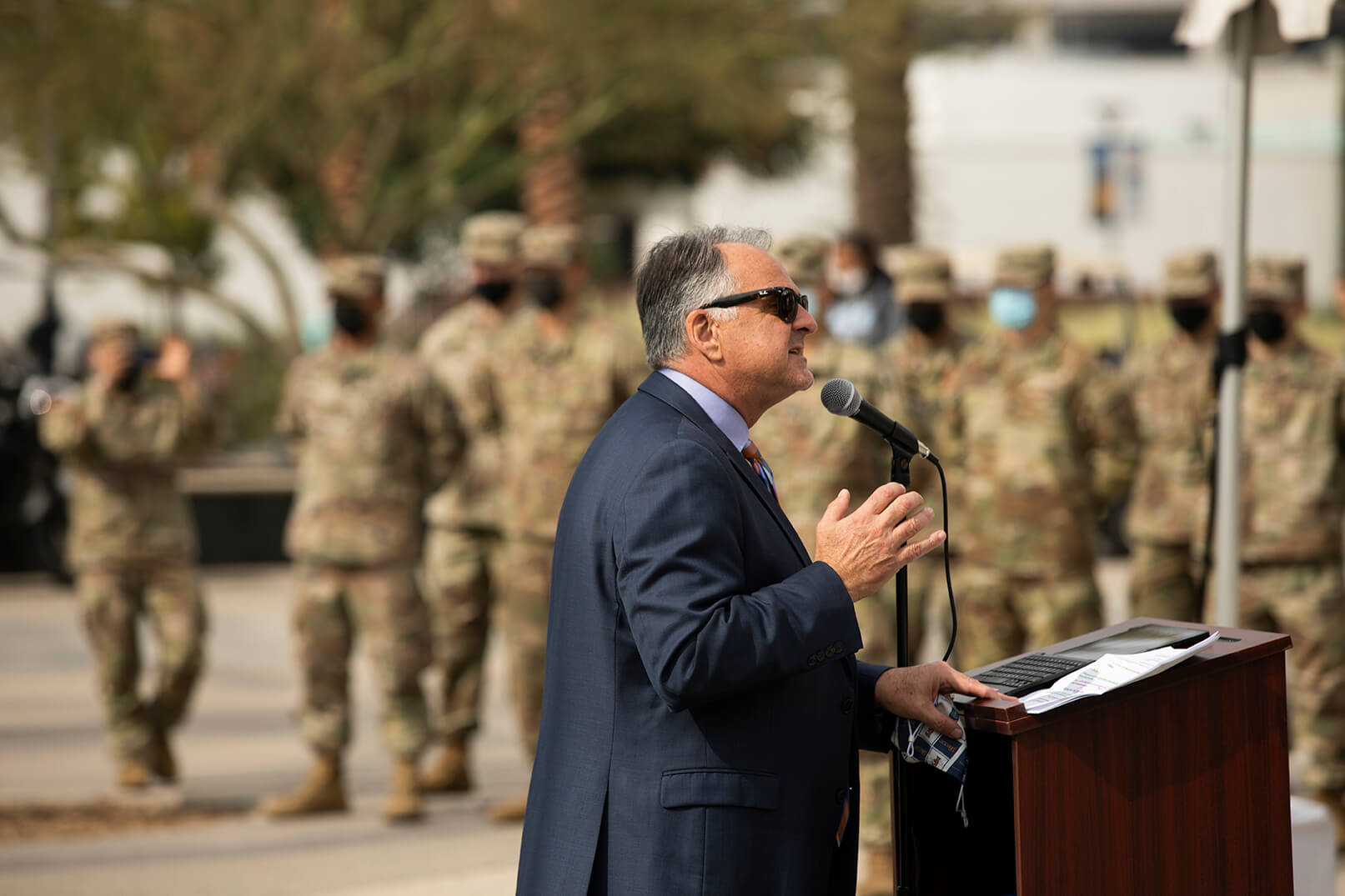 Fram Virjee speaking at podium