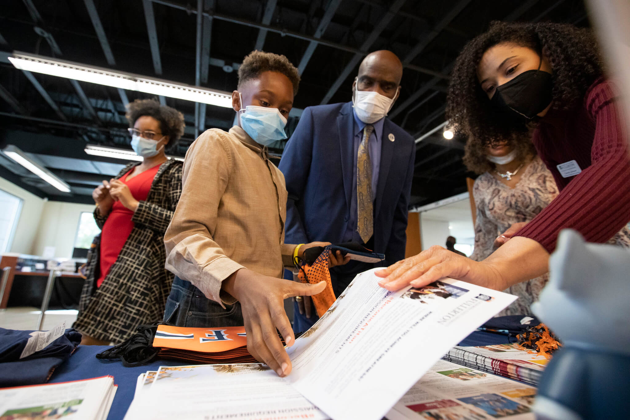 Nine year old Princeton Nkum explores CSUF's offerings with Outreach Staff.