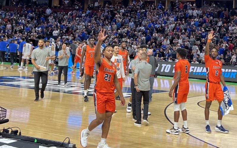 men in basketball uniforms