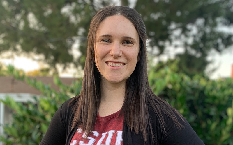 Headshot of Monique LeFeuvre wearing a maroon CSUF Titans t-shirt and black sweater