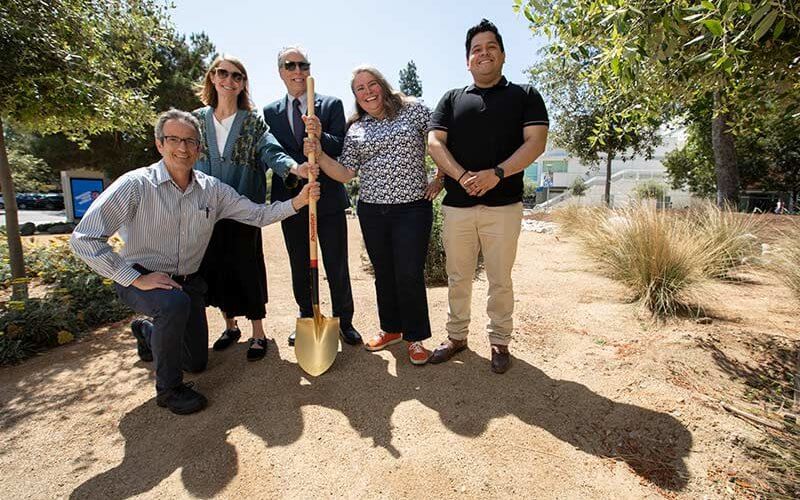 Dean Sheryl Fontaine and campus partners pose with shovel