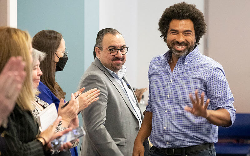 Joel Abraham waves to Academic Senate