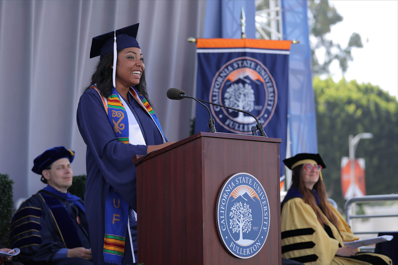 Deeyanna Pedersen speaking at podium