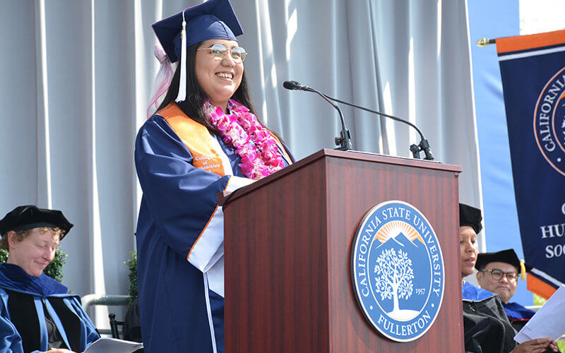 Marisela Dorado speaks at podium