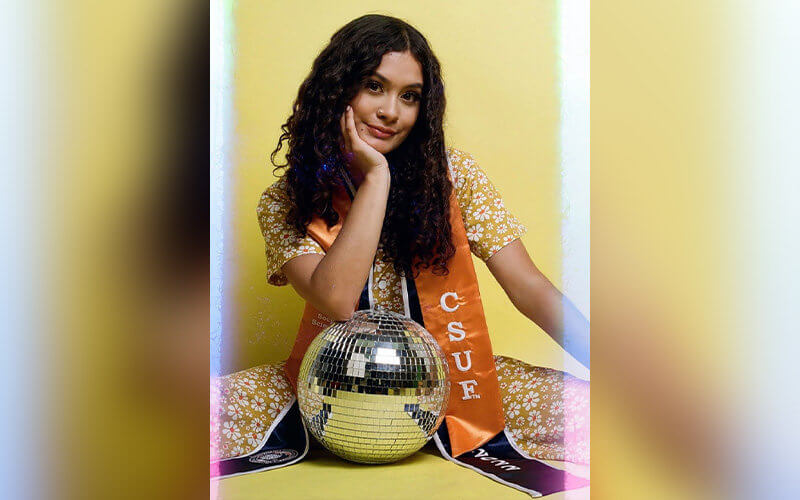 Sophia Briseno poses with disco ball