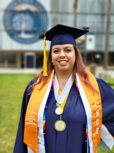 Alisa Hernandez poses in Commencement regalia