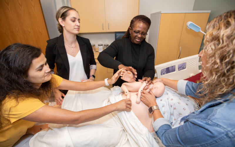 Angela Sojobi and midwifery students