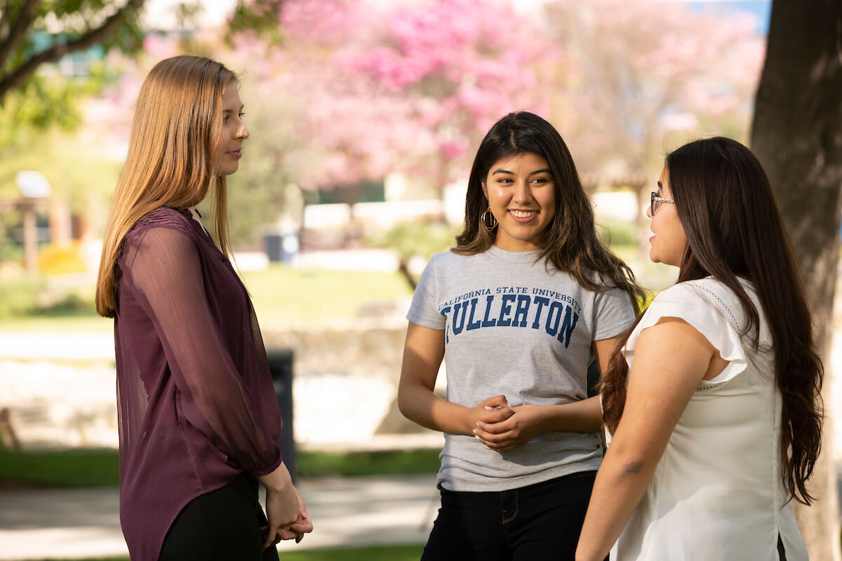 Three female students talking