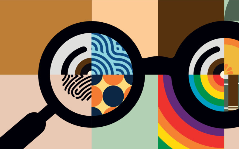 Colorful patterns inside the lens of black framed glasses