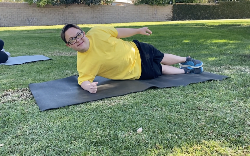Jeremy, participant in the training program, doing a side plank.