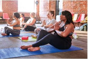 Women doing yoga in a yoga class