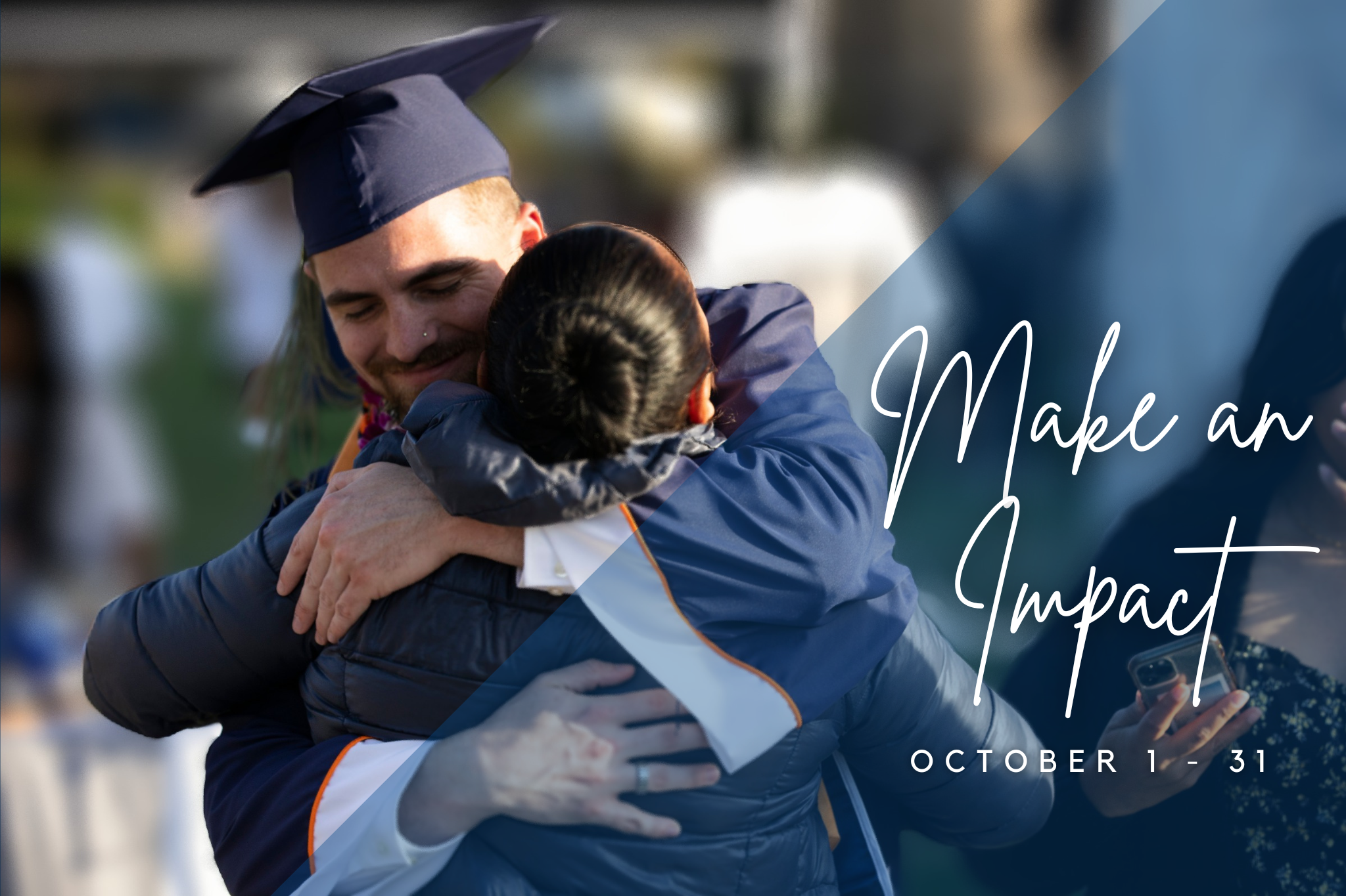 student wearing graduation regalia hugging a family member