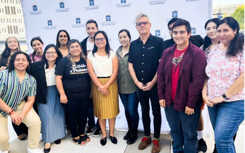 Bilingual teachers and Fernando Rodríguez-Valls, professor of secondary education and coordinator of the bilingual authorization program, center right, and Natalie Tran, professor of secondary education, center left, with teacher credential students.