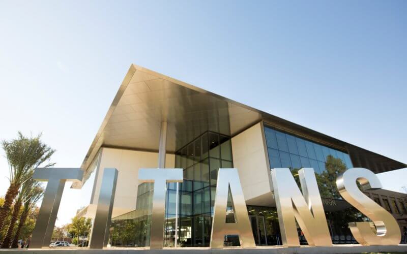 Titans Sign in Foreground with Titan Student Union in Background