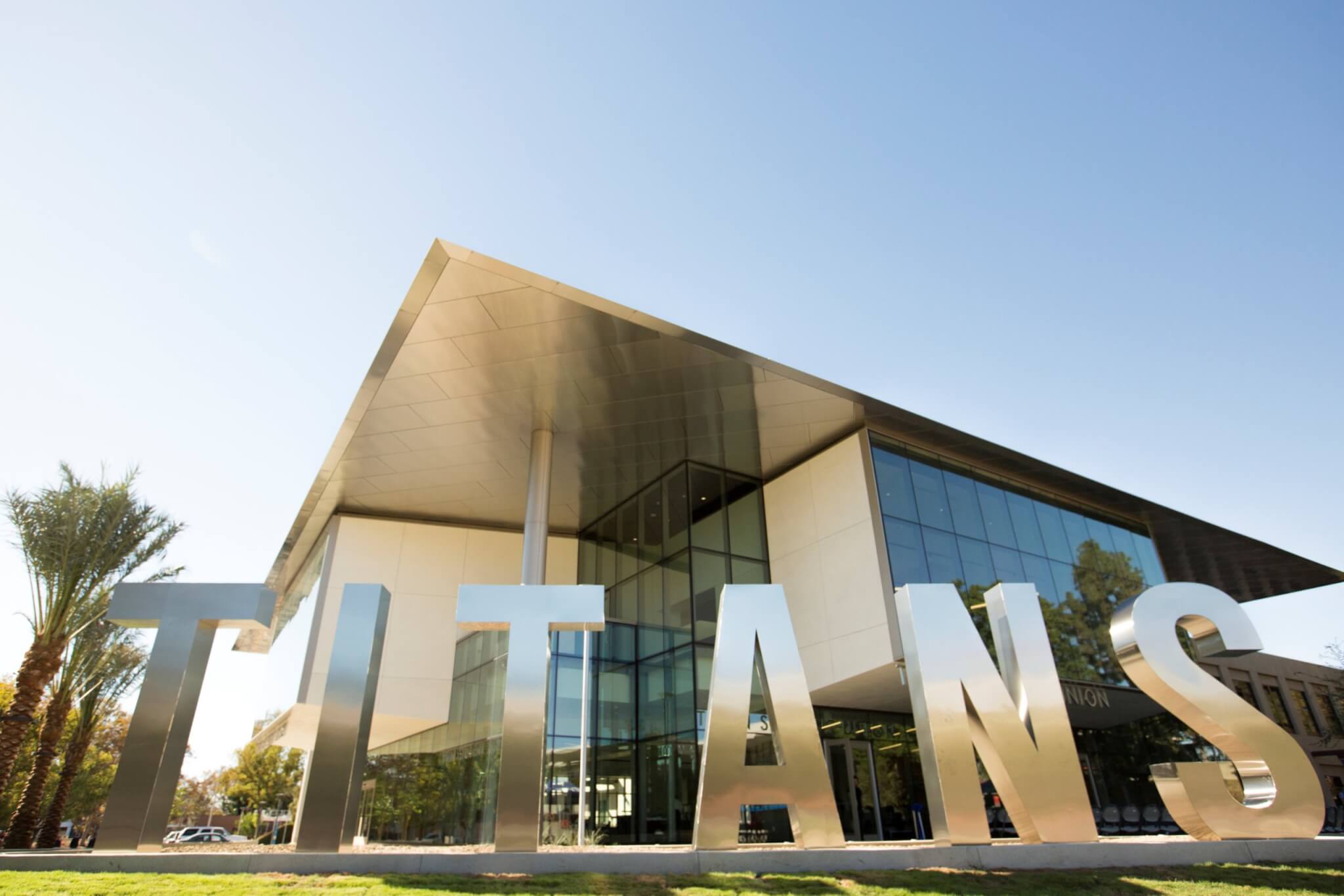 Titans Sign in Foreground with Titan Student Union in Background