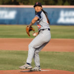 Kelsie Whitmore pitching ball from pitchers mound