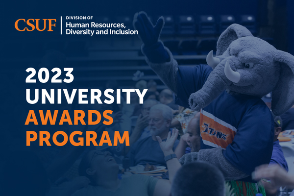 Tuffy raises right hand in celebration of University Awards Program.
