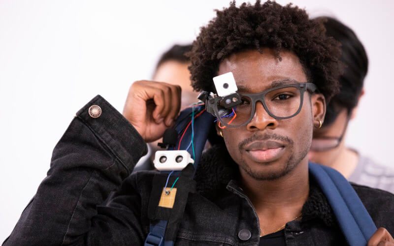 Student Rodney Nobles works with Assistive Glasses