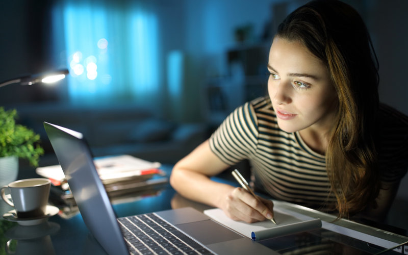 girl in front of a computer doing a test