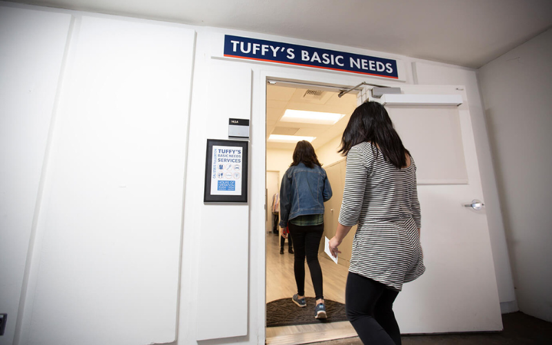 Students walking into Basic Needs Services