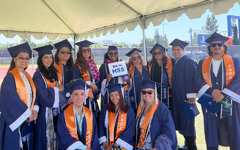 Group photo of CSUF's Class of 2022 Online Bachelor's in Humanities and Social Sciences Program graduates.