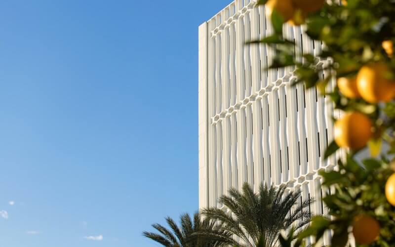 Langsdorf Hall with orange trees in foreground