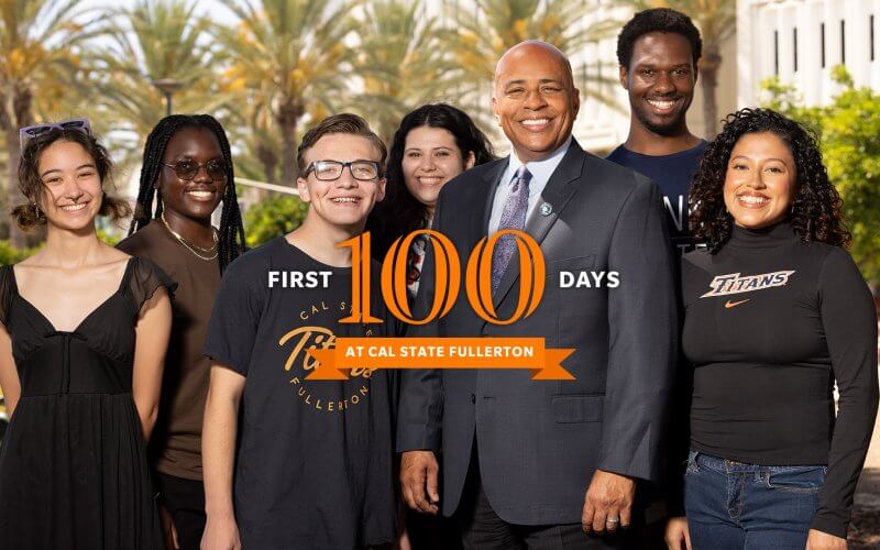 Cal State Fullerton President with diverse students outdoors by palm trees, text reads “First 100 Days.”