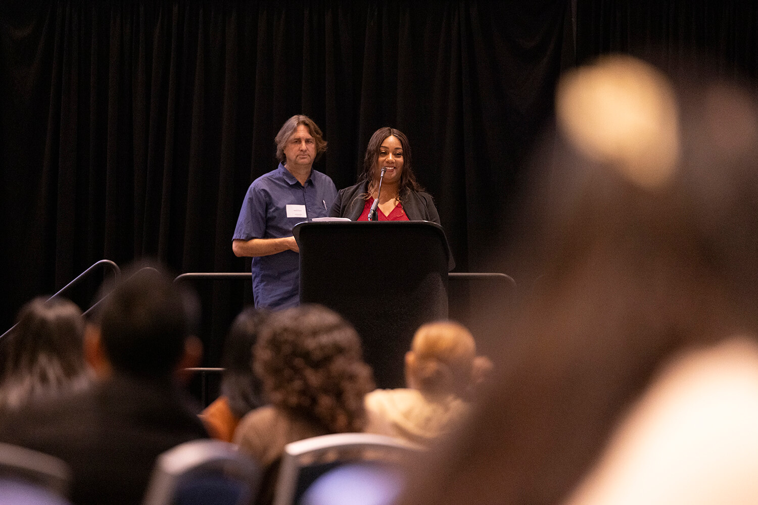 Stephanie Jeffcoat speaks about homelessness at the housing crisis symposium