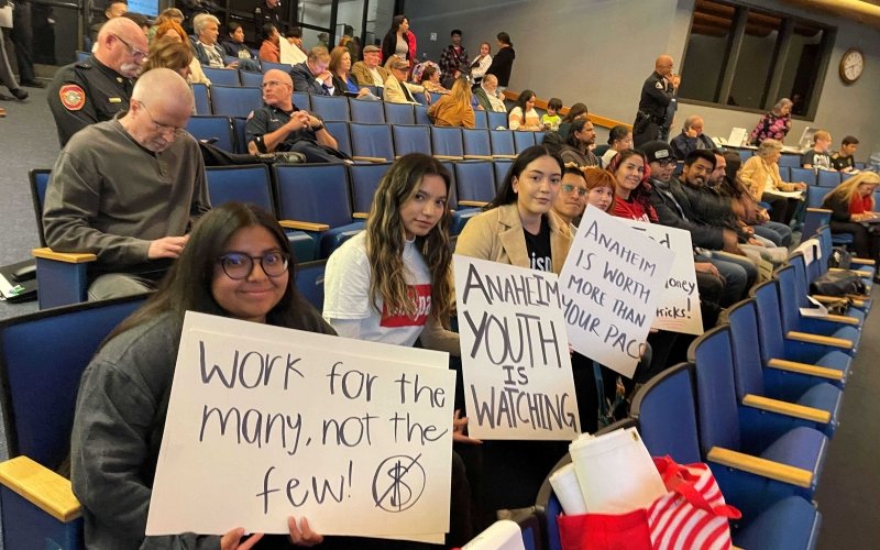 Chispa staff and volunteers, with CSUF Students Beatriz Muñoz, George Arciva, and Efren Guzman, advocate at Anaheim City Council meeting.