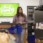 Student shopping in food pantry