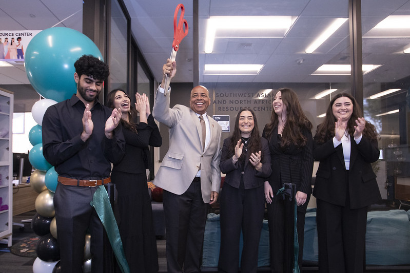 President Rochon celebrates with students and alumni at Southwest Asian and North African Resource Center opening