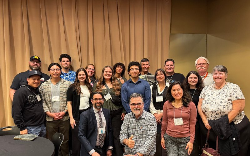 CSUF geography students, faculty, and alumni pose for a photo at the statewide conference for the California Geographical Society.