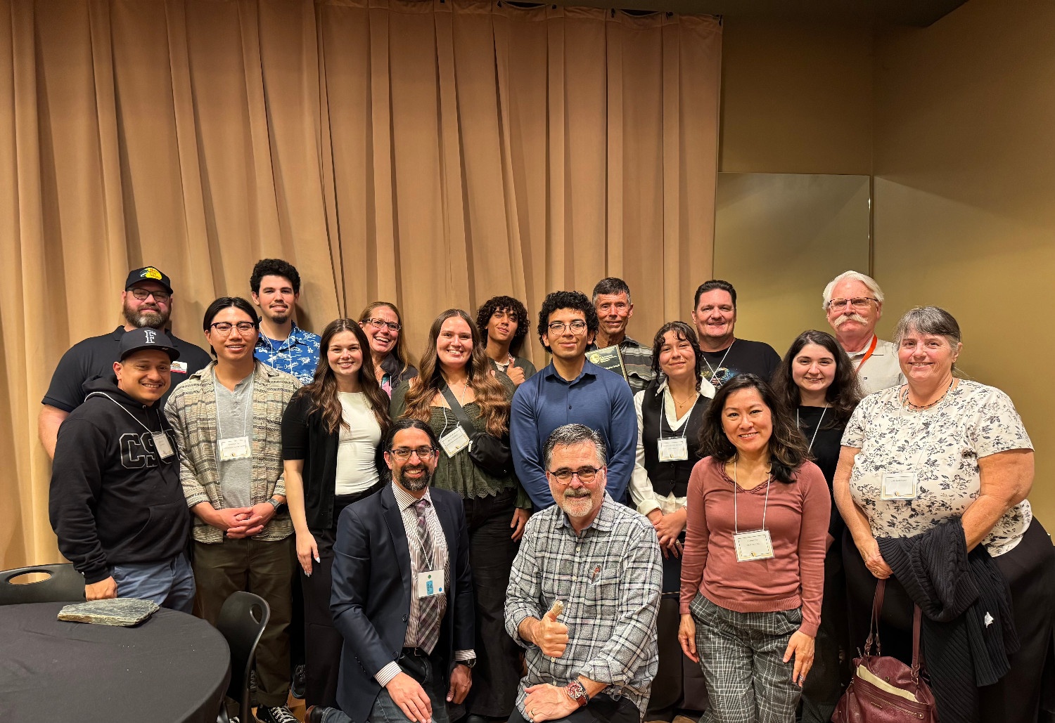 CSUF geography students, faculty, and alumni pose for a photo at the statewide conference for the California Geographical Society.