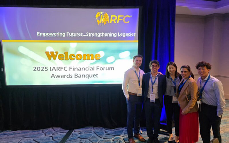 Finance students at the International Association of Registered Financial Consultants Financial Forum