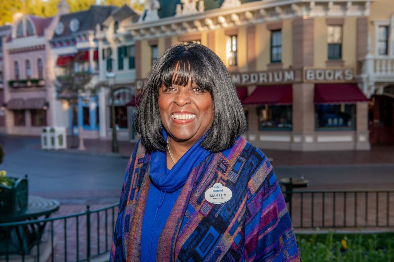 Disney Legend and author Martha Blanding poses for a portrait at Disneyland's Main Street, U.S.A.