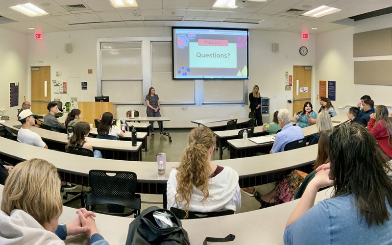 franetic-digital-marketing Students present research in a classroom.