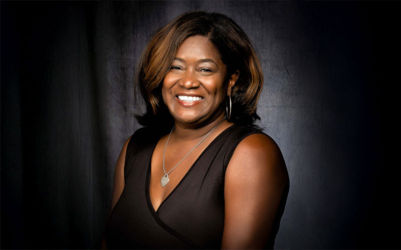 Professional headshot of Monique Cain.