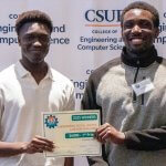 Future computer engineers Tony Amin, left and Festo Bwogi