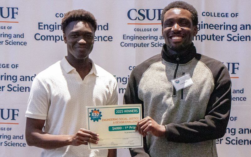 Future computer engineers Tony Amin, left and Festo Bwogi