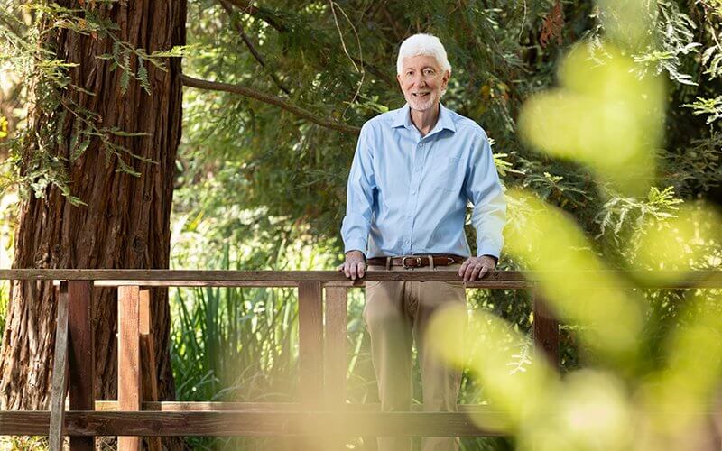 Fran Colwell stands in the Arboretum and Botanical Garden at Cal State Fullerton.