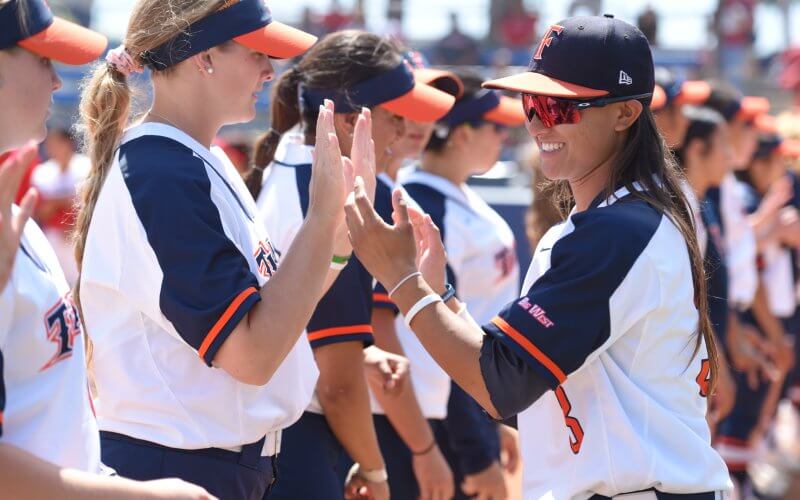Kelsie Whitmore celebrates with the Titans Softball team.
