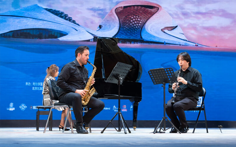 John Hallberg and Michael Yoshimi perform at the 20th World Saxophone Congress with pianist Wenjing Liu-Hallberg.