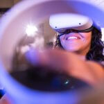 Wendy Joya with Virtual Reality VR headset as part of her biomanufacturing research
