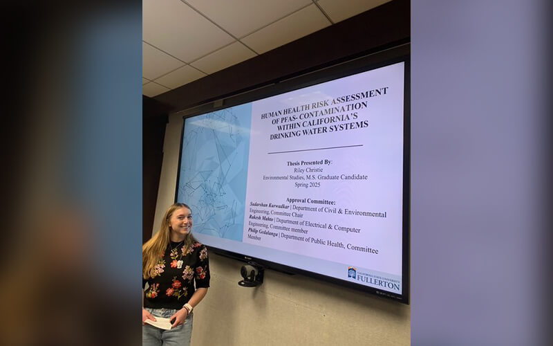 Riley Christie defends her thesis.